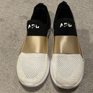 APL RUNNING SHOES. SLIP ON SIZE 8